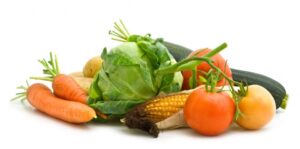 healthy foods for dogs (carrot, corn, cabbage and tomatoes)
